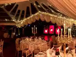 High end Garden Party Marquee Hire Oxfordshire UK Stylish party marquee with dance floor and atmospheric lighting in Oxfordshire